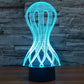LED desk lamp with glowing cyan wireframe jellyfish style shade and black base