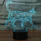 Geometric walking cat night light with blue glowing lines on a black base