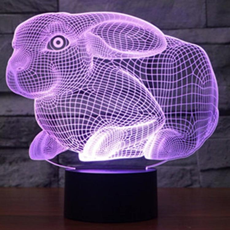 Rabbit-shaped desktop night lamp with purple glow and black round base