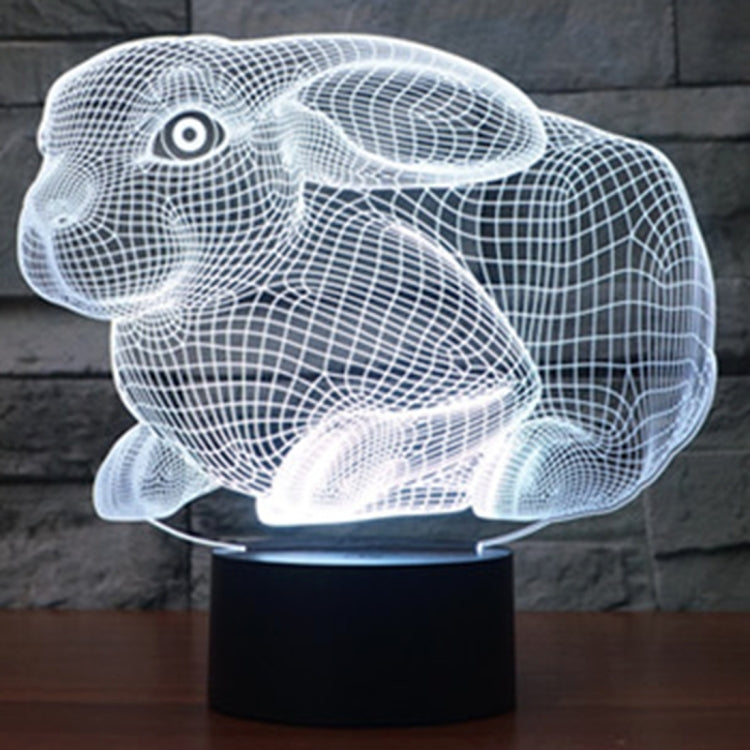Rabbit-shaped desktop night lamp with white glow and black round base