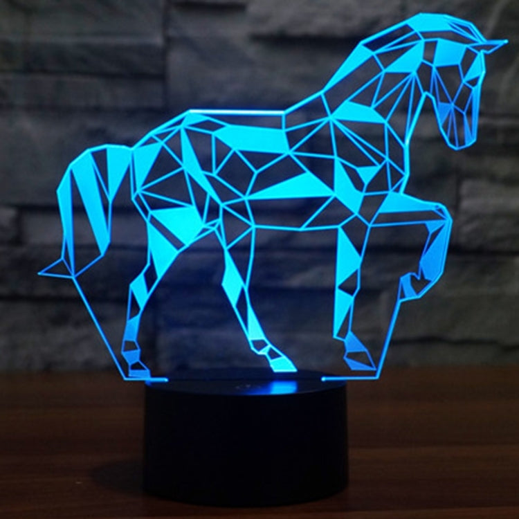 Geometric horse-shaped LED desk lamp with blue glow on a black base.