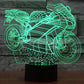 Motorcycle-shaped LED desk lamp, green glowing wireframe on black base