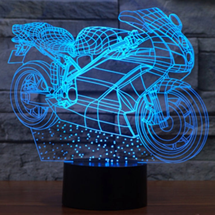 Motorcycle-shaped LED desk lamp, blue glowing wireframe on black base