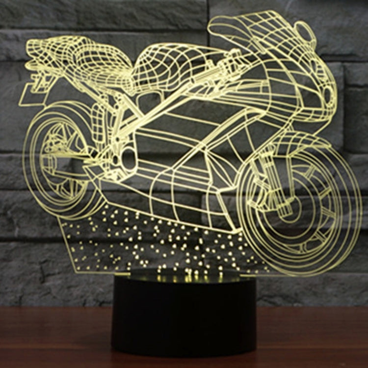 Motorcycle-shaped LED desk lamp, yellow glowing wireframe on black base
