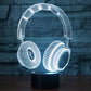 Headset-shaped desk night light with cool blue LED glow on round base