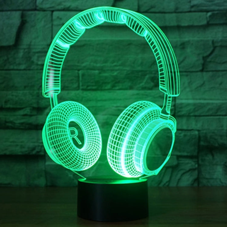Headset-shaped desk lamp with green LED glow on round black base