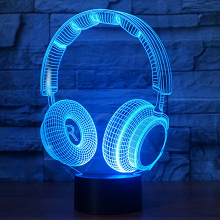 Headset-shaped desk lamp with blue LED glow on round black base
