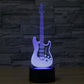 Guitar-shaped LED night light with black base, blue/purple glowing guitar