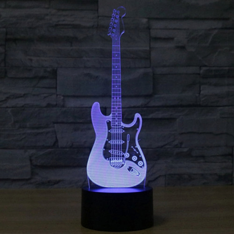 Guitar-shaped LED night light with black base, blue/purple glowing guitar
