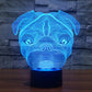 Dog-shaped LED night light lamp with blue glow and black base
