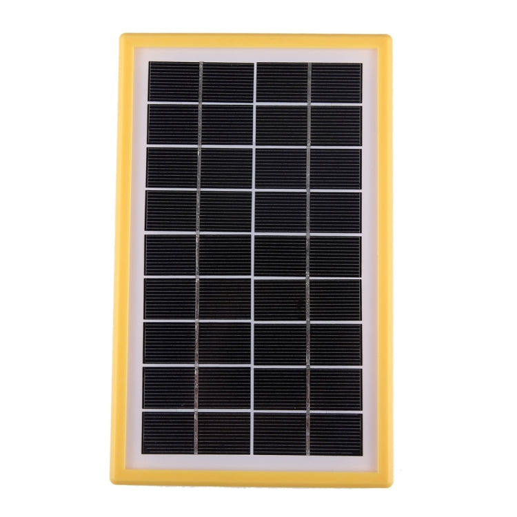 Framed foldable-looking solar panel with dark photovoltaic cells and yellow border