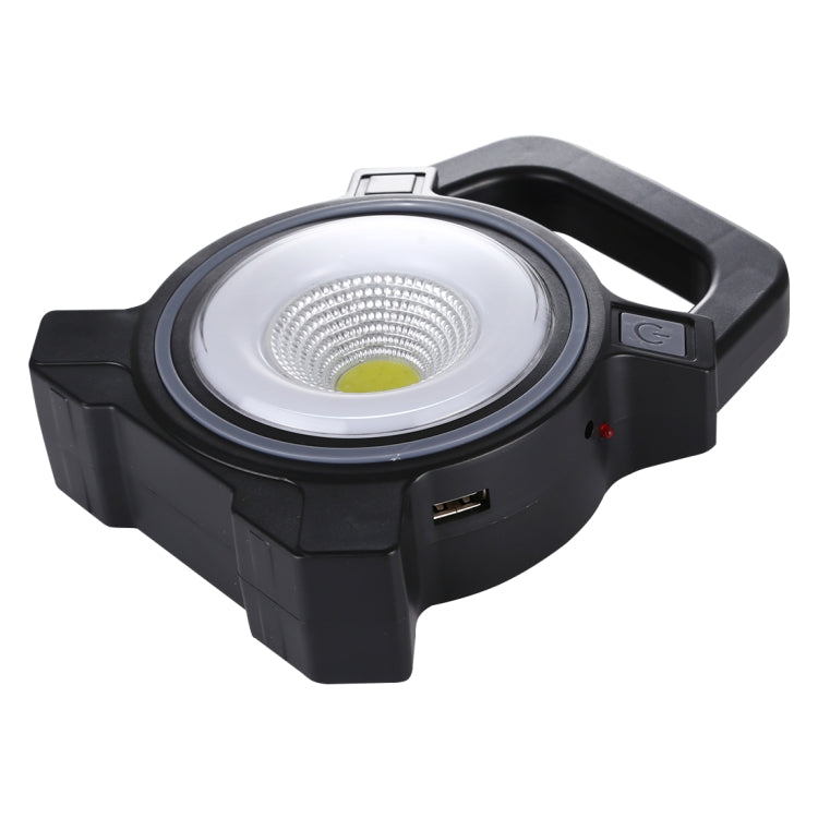 Black handheld camping lamp with COB LED, power button, and charging port