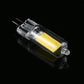 Glass LED bulb angled view with clear capsule, two pins, and yellow LED inside