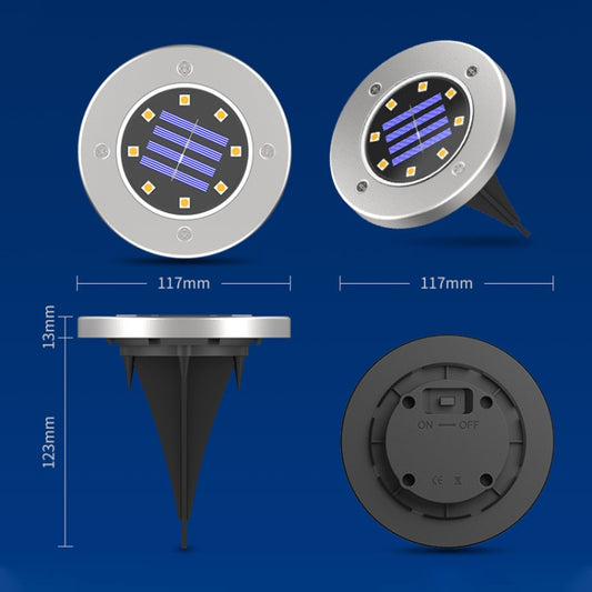 Solar lawn stake light with round stainless housing, LED face, and base switch panel