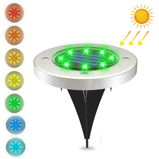 Solar garden stake light with stainless top and glowing green multicolor LEDs