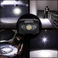 Headlamp beam showing strong white light in dark indoor space