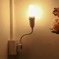 E27 bulb holder extension with red switch and US plug holding an LED bulb