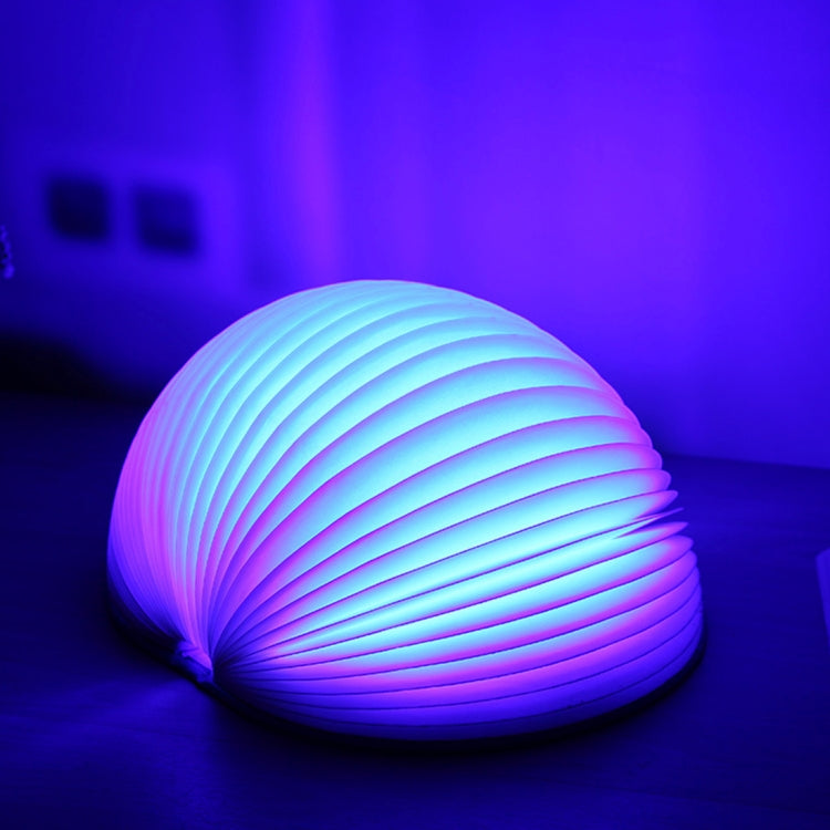 Glowing semicircle folding night light with blue-purple light