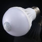 E27 infrared motion sensor LED bulb, angled view with side sensor lens