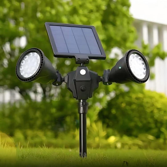 Solar LED spotlight with dual round heads and foldable solar panel, black finish