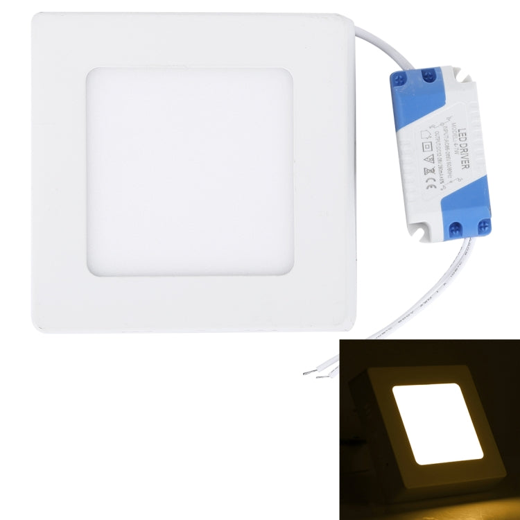 Square white LED panel light with attached driver cable and power connector