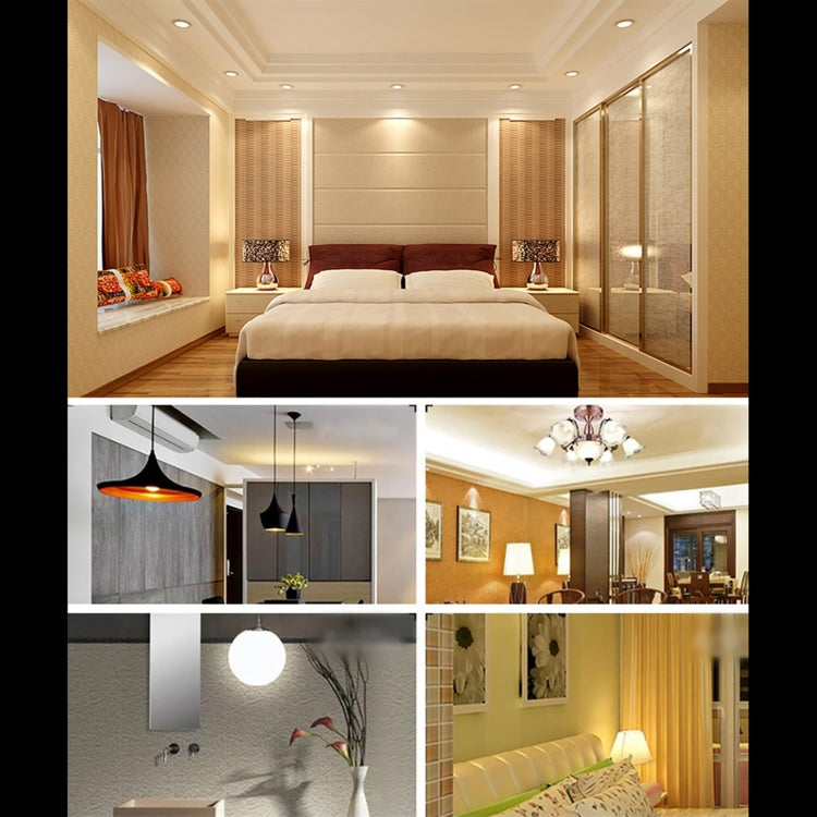 Glowing LED bulb in a ceiling light fixture, warm white SMD corn bulb