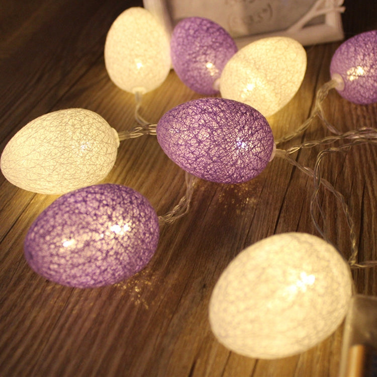Egg light string with purple and warm white cotton-thread globe bulbs