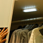 LED wall light bar night light, illuminated strip mounted overhead in a closet
