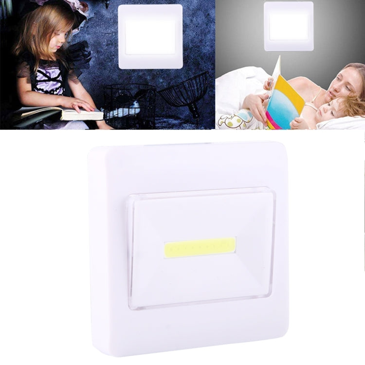 Square white COB switch night light lamp with yellow LED strip centered on the front panel