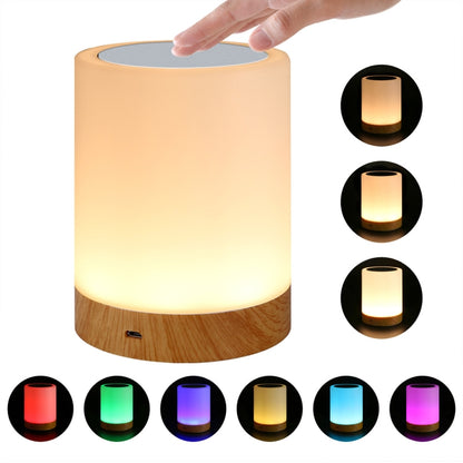 Touch charging night light with wood-grain base, warm glow cylinder