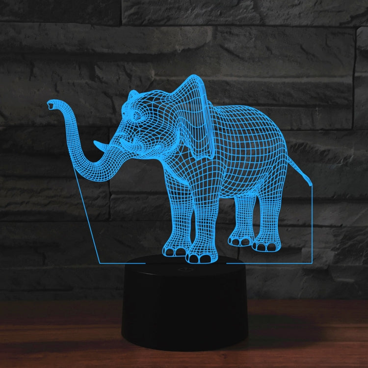 Elephant-shaped 3D LED table lamp with blue wireframe glow in a clear display