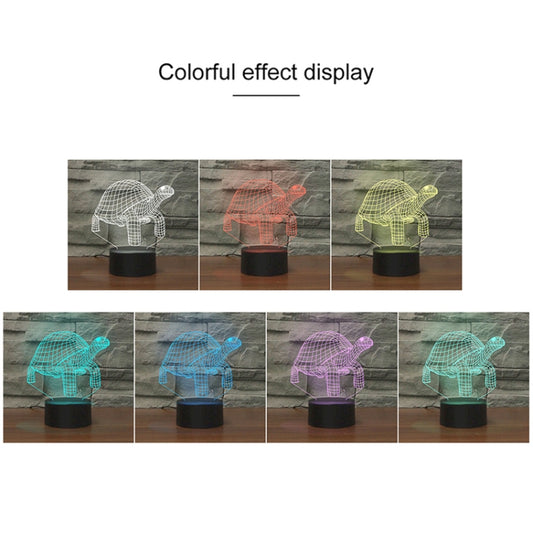 Tortoise 3D LED night light showing multiple colored glows on black base.