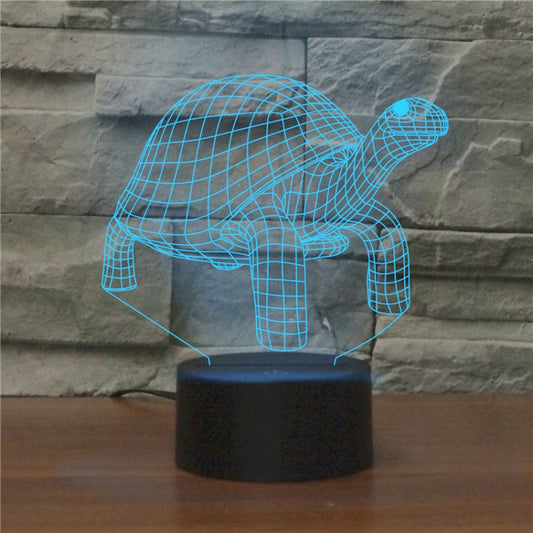 Blue wireframe tortoise 3D LED night light on black base, glowing.