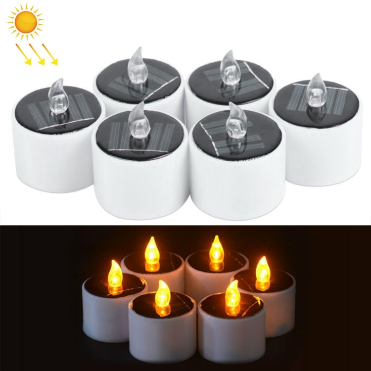 Set of white LED candle night lights with clear flame topper and dark solar panel tops