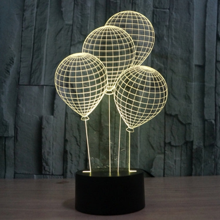 Balloon-style globe desk lamp with gold wire spheres and black cylindrical base