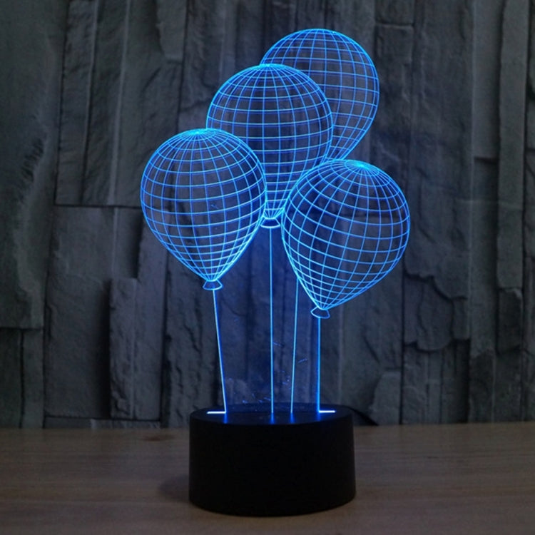Balloon-style globe LED desk lamp with blue lit wire spheres on black base