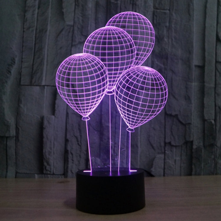 Balloon-style globe LED desk lamp with purple lit wire spheres on black base