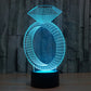 Diamond ring style stereo desk lamp, cyan LED light with black base