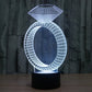 Diamond ring style stereo desk lamp, white LED light with black base