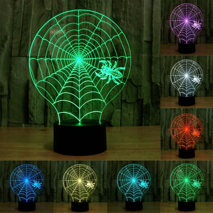 Cobweb-style desk night light with green glowing spiderweb globe on black base