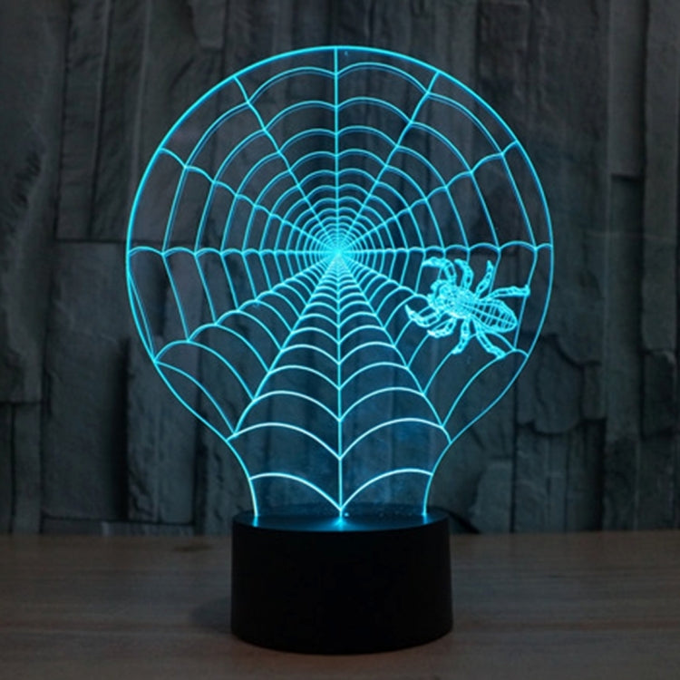 Cobweb style 3D desk lamp with glowing blue spiderweb and spider silhouette