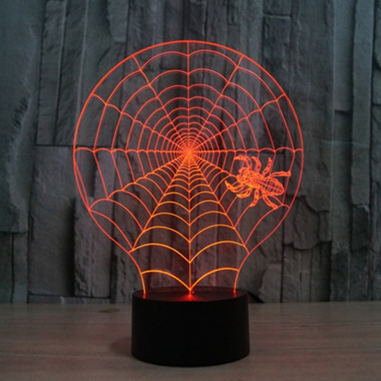Cobweb-style desk night light with orange glowing spiderweb globe and winged figure