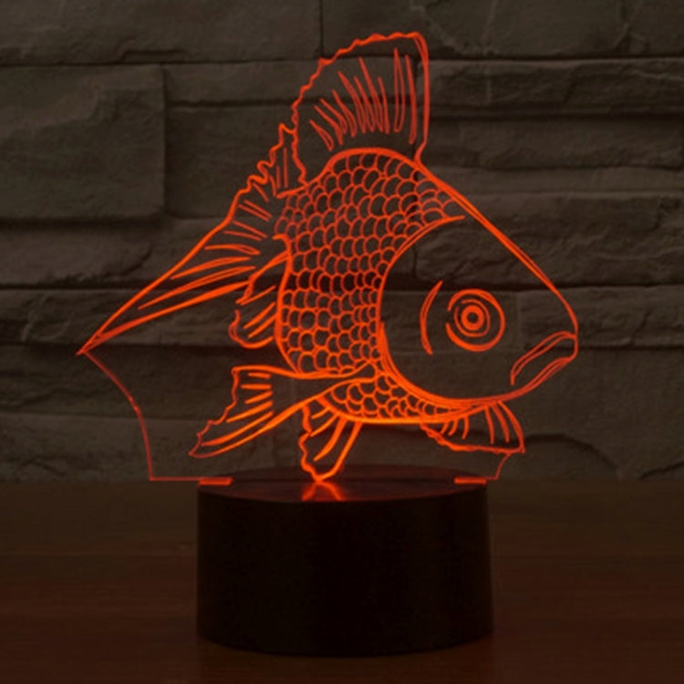 Goldfish-style 3D desk night light glowing red fish on a black cylinder base