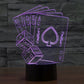Poker-style neon desk lamp with glowing purple playing card outlines on black base