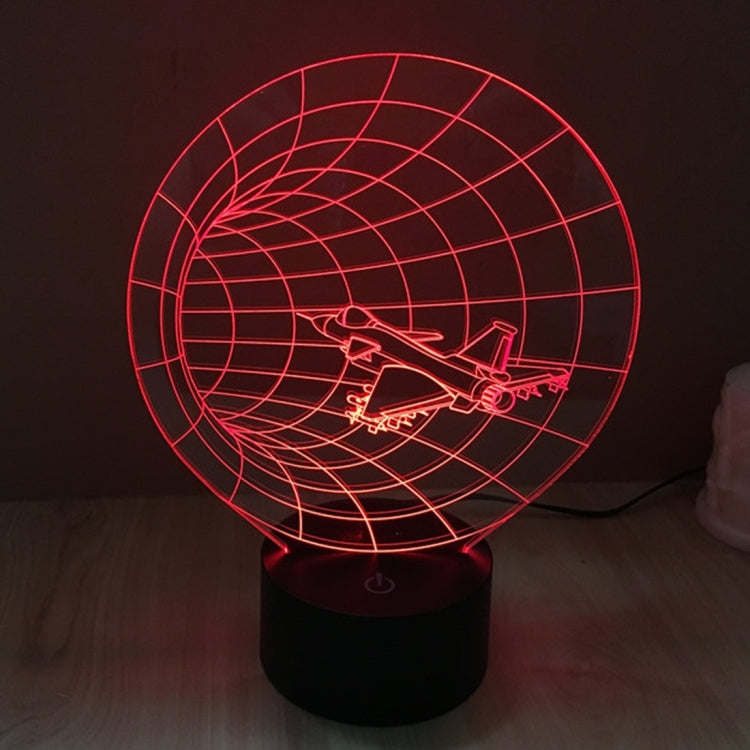 Time machine style desk lamp with red grid globe and airplane light on black base