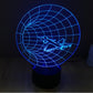 Time machine style desk lamp with blue grid globe and airplane light on black base