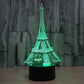 Eiffel Tower desk night light with green glowing tower and black round base