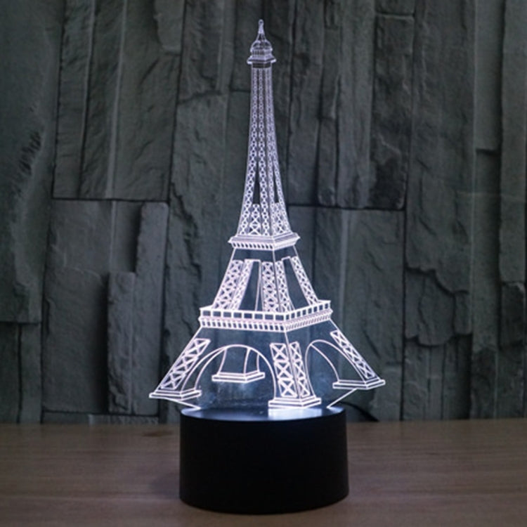 Eiffel Tower desk night light with white glowing tower and black round base