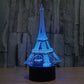 Eiffel Tower desk night light with blue glowing tower and black round base