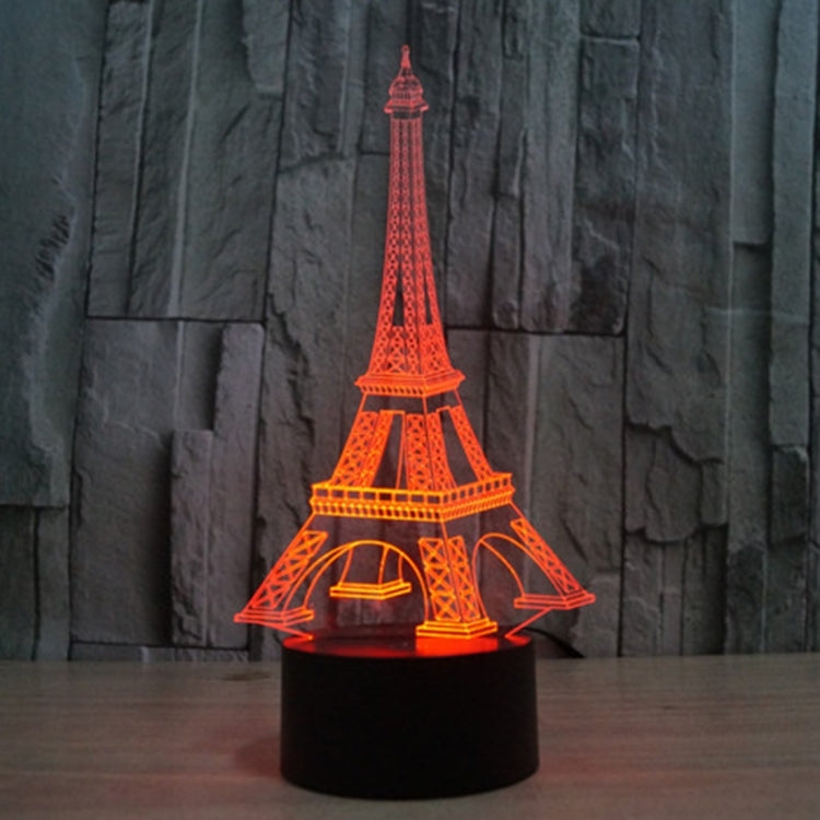 Eiffel Tower LED desk lamp glowing red-orange on black base